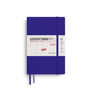 Leuchtturm Weekly Planner 2026 in B6+ paperback format with purple cover, elastic closure, and ribbon bookmarks, week-to-view layout.