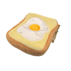 Yup! Bread Egg Toast Zipped Pouch shaped like toast with an egg, soft-touch feel, fun organiser for pens, makeup, tech gear, and snacks.