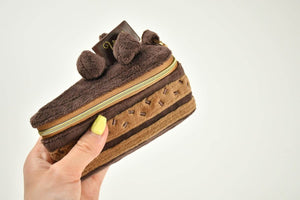 Yup! Chocolate Cake Zipped Pouch with a soft-touch feel, perfect for organizing pens, makeup, or snacks. Fun, functional, and gift-ready.