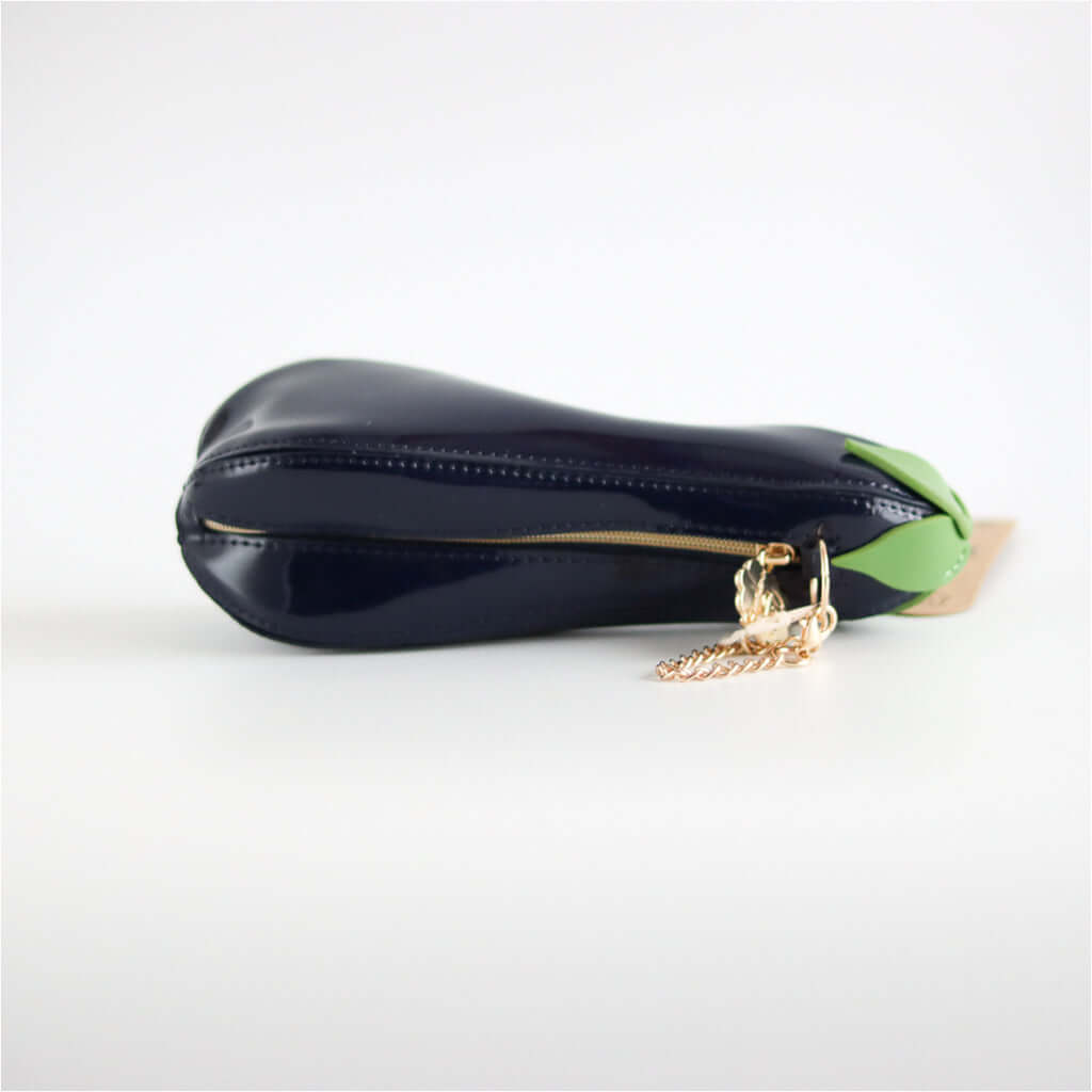 Yup! Eggplant Zipped Pouch, shaped like a real eggplant with soft-touch feel, shown on side with zipped closure for storage.