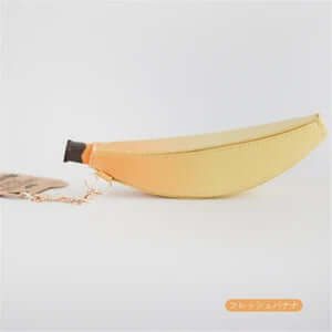Fun banana-shaped zipped pouch, soft-touch, versatile organizer for pens, makeup, tech gear, and snacks. Great gift idea.