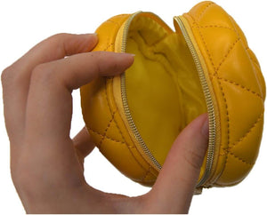 Hand holding a yellow Yup! Fresh Pineapple Zipped Pouch with quilted design, open to reveal interior. Perfect for organizing small items.